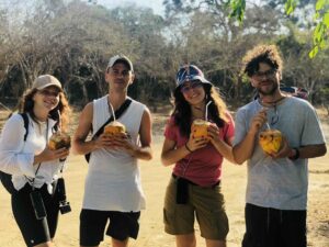 German friends enjoying a cold king coconut on a Kumana safari with Arugambay Agenda.